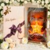 Coffret cadeau baptême fille symbolique contenant certificat d'étoile et documents personnalisés